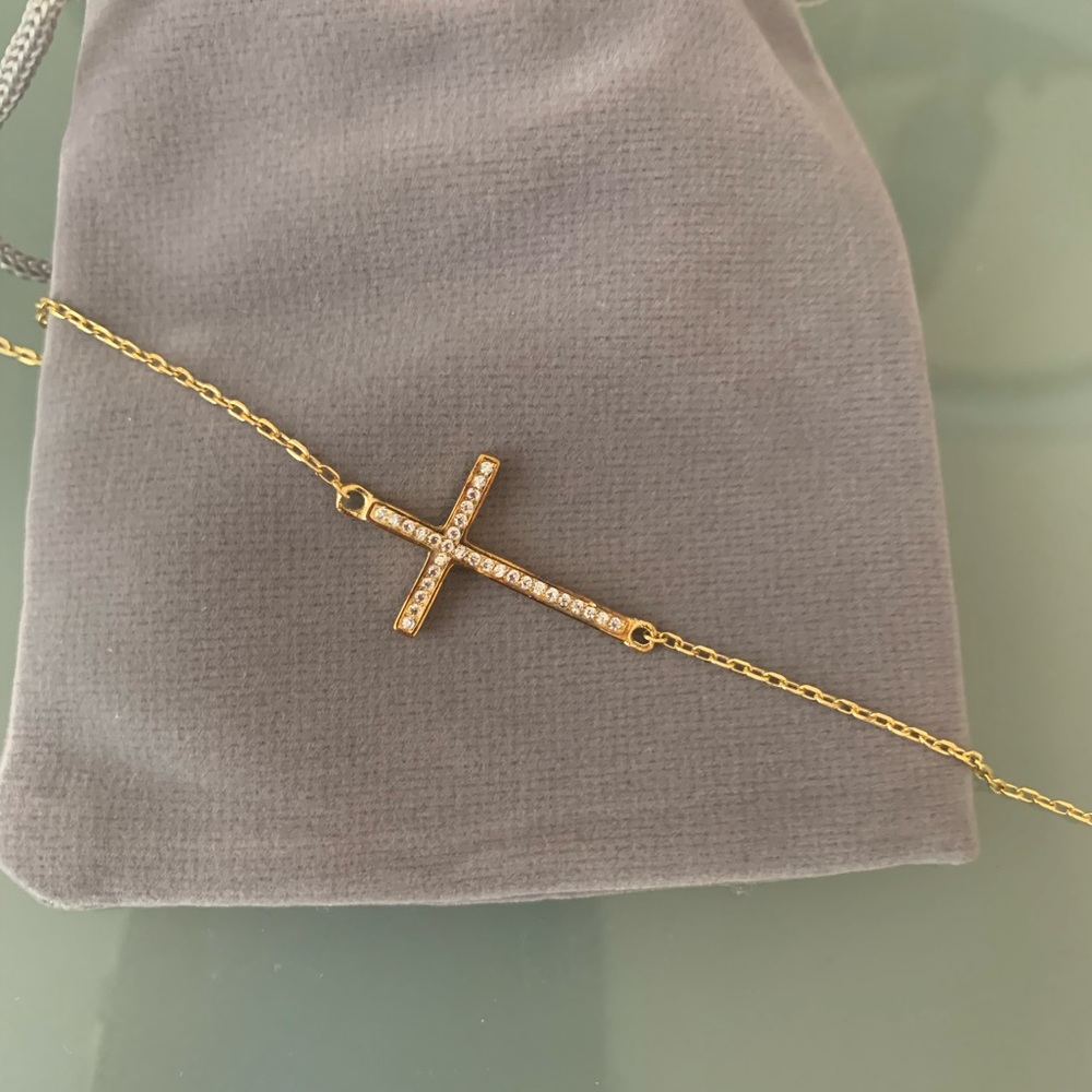 Beautiful CZ gold plated cross bracelet